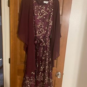 New with tags. Tahari, size 16. Also, wrap. Color is more eggplant than purple.